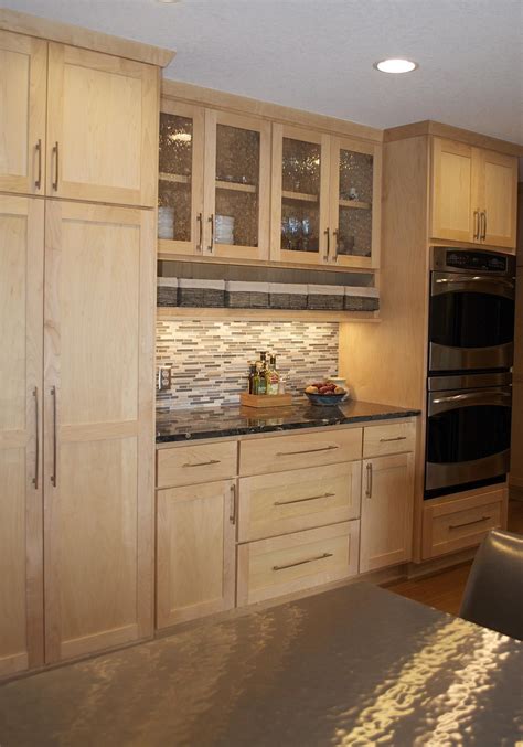 white or stainless steel with wood cabinets|kitchen cabinets with wooden storage doors.